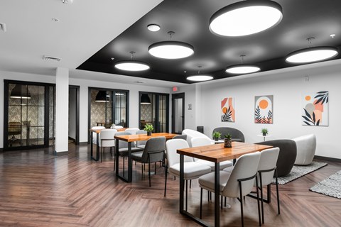 a large room with tables and chairs